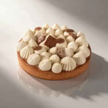 Tarte Gourmandise, pâte sablée, chantilly vanille, ganache Dulcey et noix de pécan, de Stéphane Pasco, Pâtissier à Nantes et Vertou